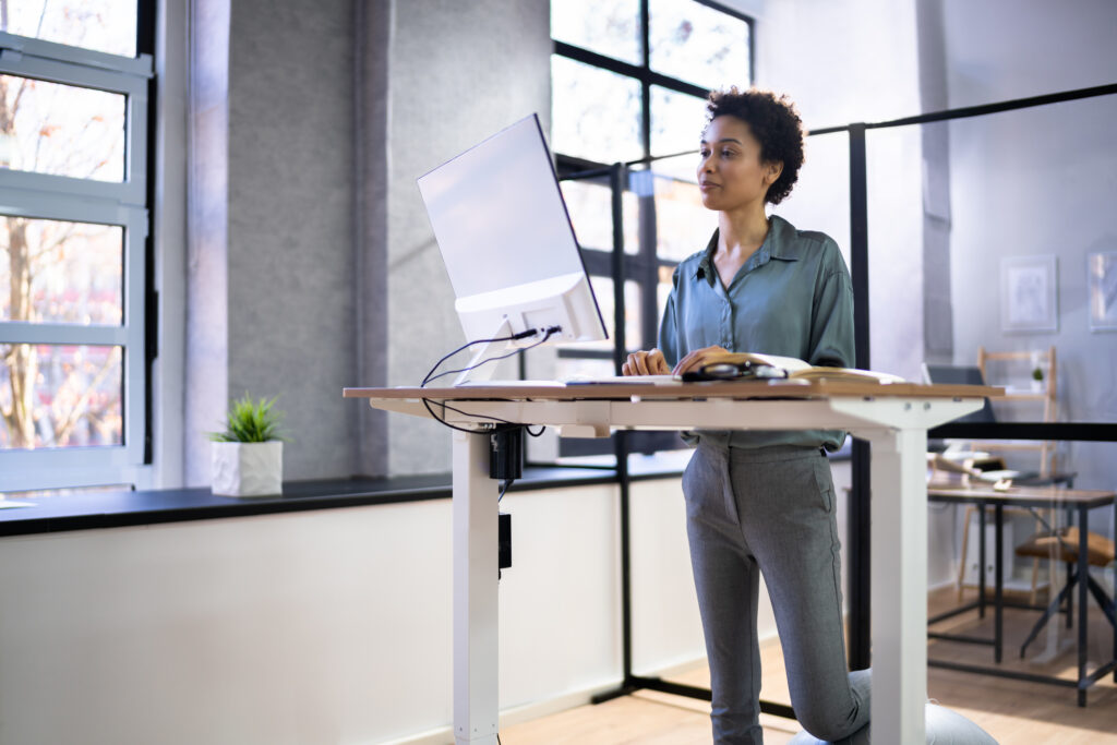 Adjustable Height Desk Stand In Office